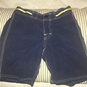 Lot of J Crew swim trunks. Used condition, faded.